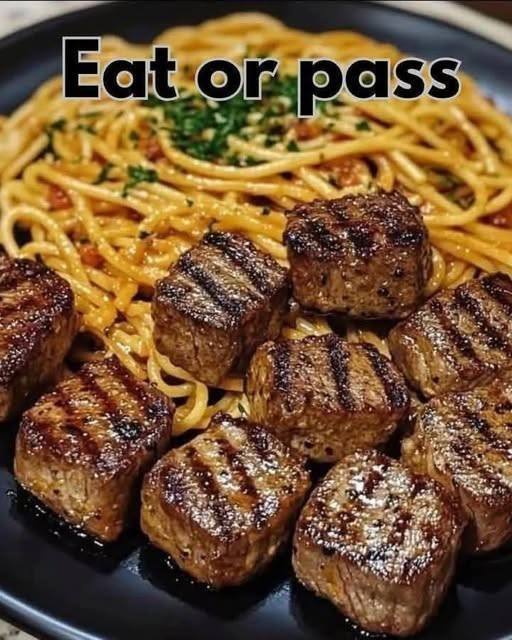 Sizzling Garlic Butter Steak Bites with Creamy Spaghetti
