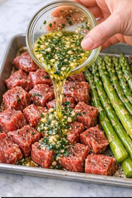 sirloin steak cubes and asparagus