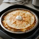 Air Fryer Cheese Quesadillas: Tortillas Secured Against Airflow